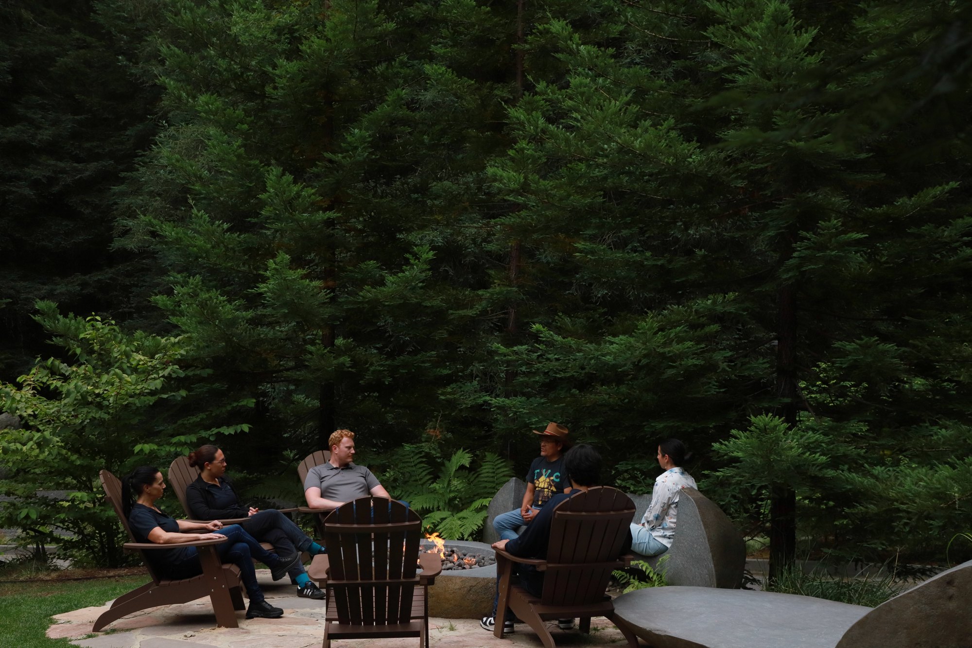 The circle seated among the redwoods and ferns at 1440