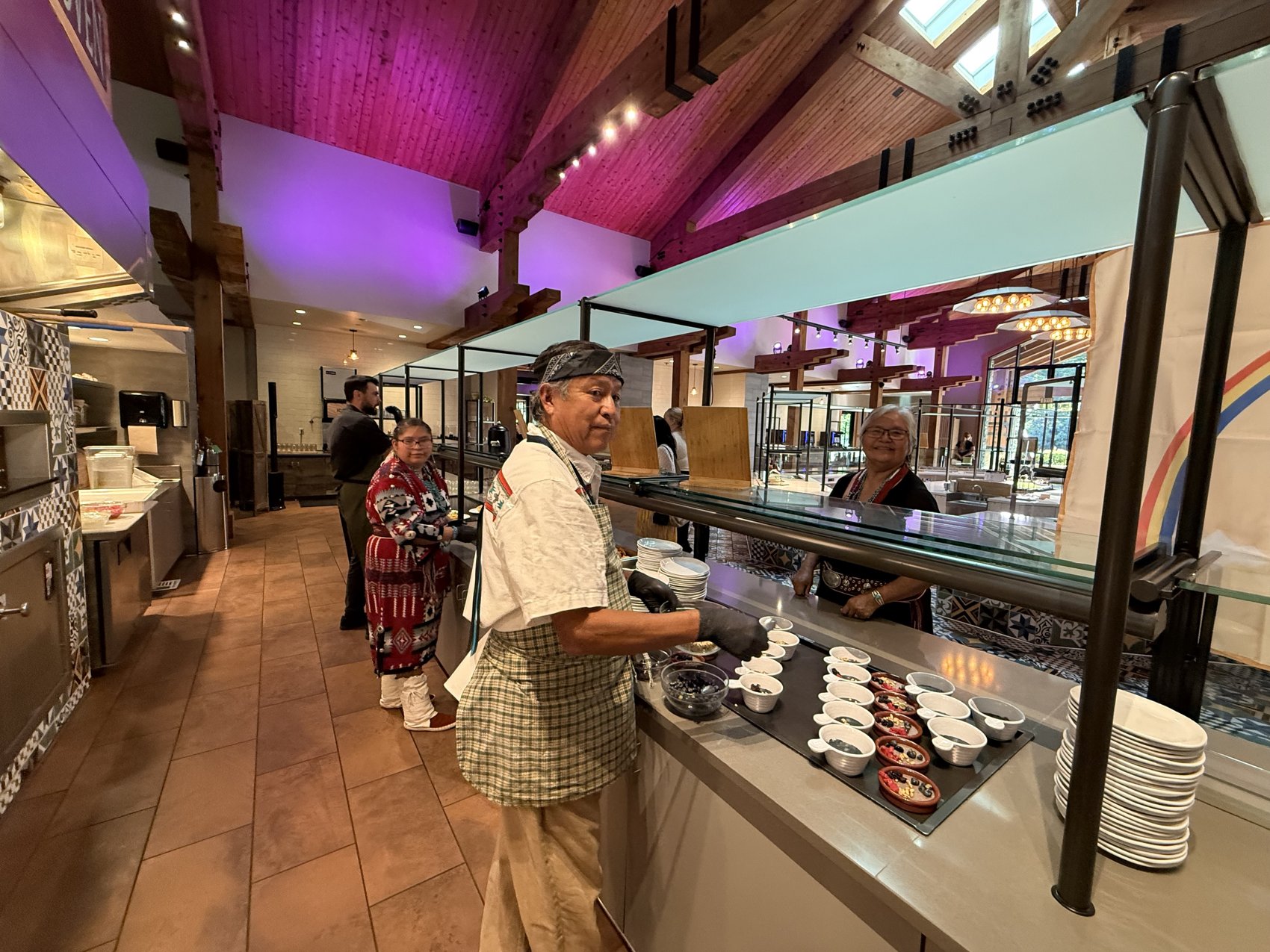 The cooks at the serving line