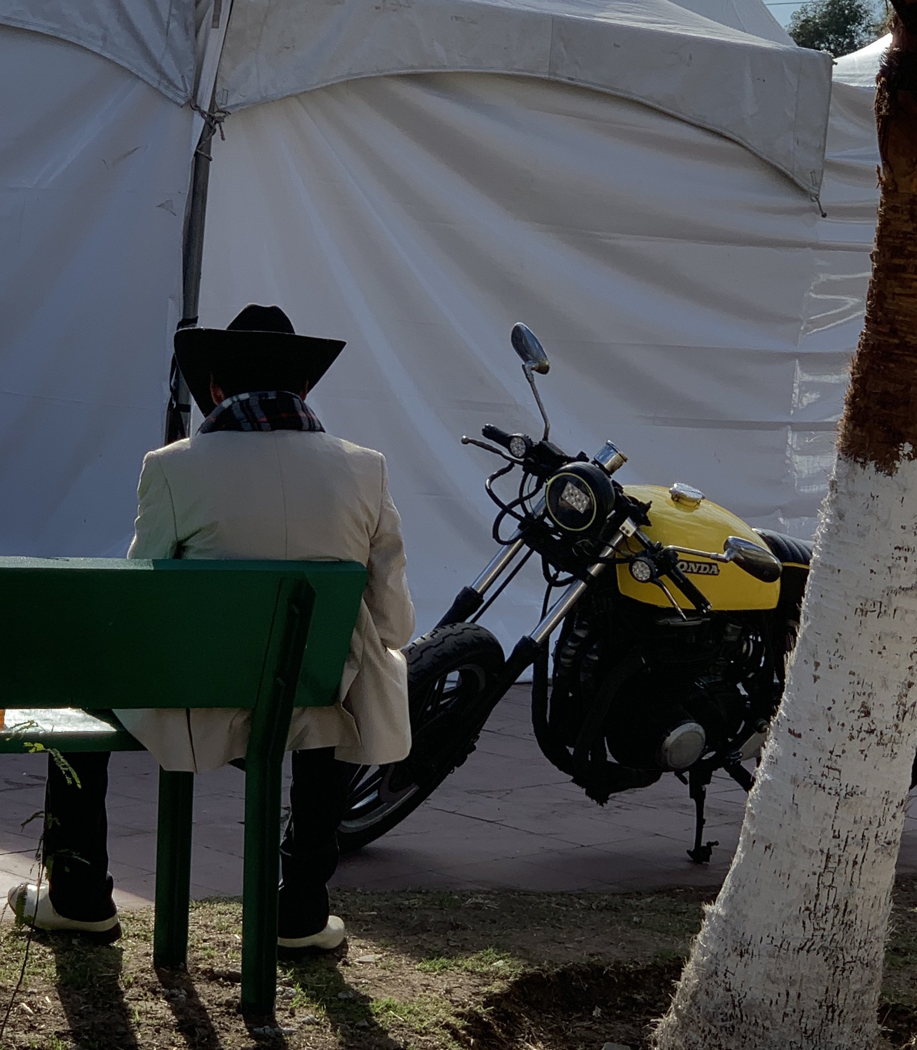 The elder and the yellow motorcycle